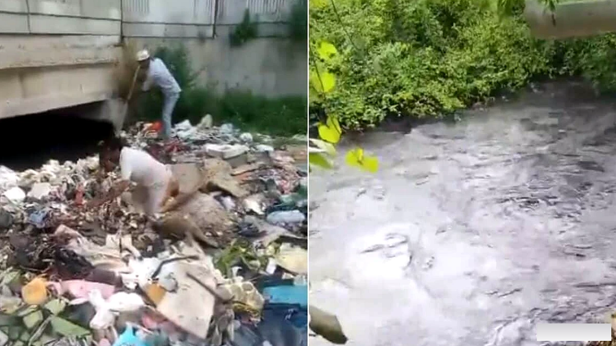 दिल्ली का एक आदमी उस नाले में बेचैन होकर तलाश कर रहा है जहाँ उसका बेटा पतंग का पीछा करते हुए गिर गया था | वीडियो